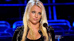 "Britney spears looks annoyed and confused"